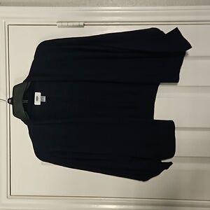 Blue cardigan. It sits at waist